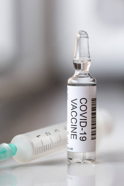 istock Coronavirus vaccine vial and syringe 1214509066