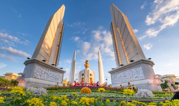 Democracy monument historical landmark in capital of thailand at sunset time in Bangkok Thailand Bangkok , Thailand : july 28 2019 ; The Democracy Monument is a public monument in the centre of Bangkok as a memorial to the change of government from absolute monarchy to democracy , capital of Thailand. Thailand thailand king stock pictures, royalty-free photos & images