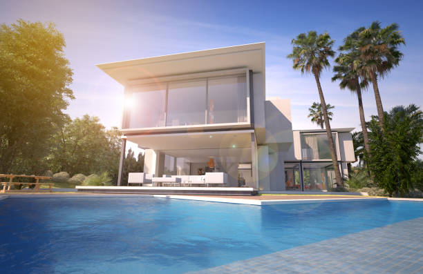 istock Impressive modern villa with pool and exotic garden 1214512464