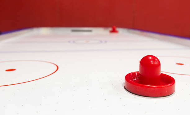 istock Close-up table for playing air hockey. Team game 1214514539