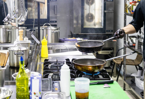 istock Chef in the kitchen at the restaurant prepares dishes 1214514625