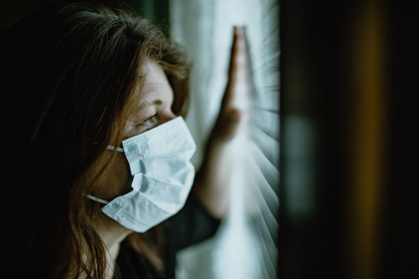 istock woman in isolation at home for virus outbreak 1214516011