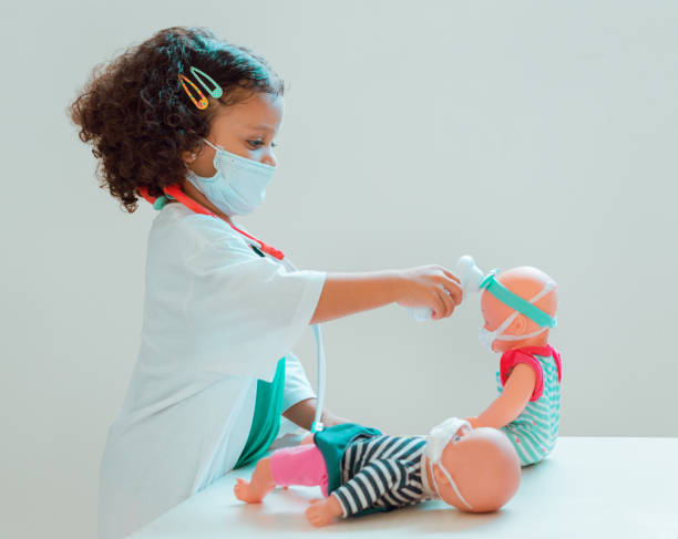 istock A little doctor measures her patient's fever 1214517398