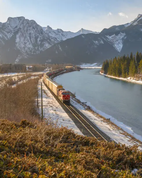 Moving freight train in the Rocky Mountains at Exshaw, Alberta, Canada