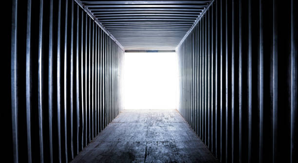 Abstract dark background, an empty inside container shipping Abstract dark background, an empty inside container shipping cargo container container open shipping stock pictures, royalty-free photos & images