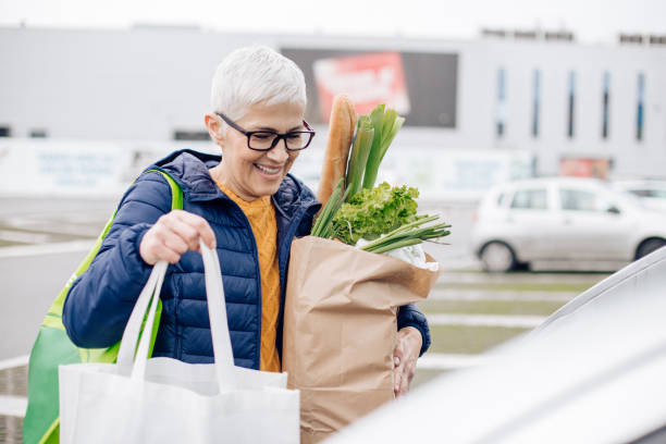 istock Woman holding the tote  bags 1214518607