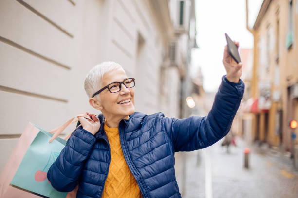 istock Charming woman taking a selfie 1214518633