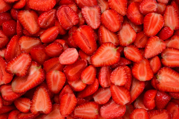 istock Strawberry slices. Fresh berries macro. Fruit background. Top view. 1214522240