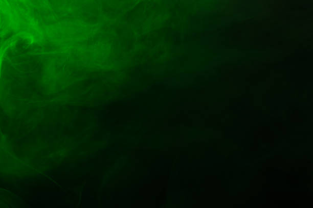 istock Green steam on a black background. 1214522682