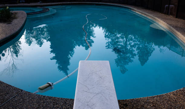 istock Pool Service Clean and Refreshing Pool with Blue Water 1214522929