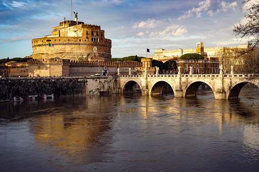 ROME, ITALY - 27 SEPTEMBER 2014. Rome, Italy. Ponte Sant Angelo, Castel Sant Angelo and Tiber River. Built by Hadrian emperor as mausoleum in 123AD ancient Roman Empire landmark.