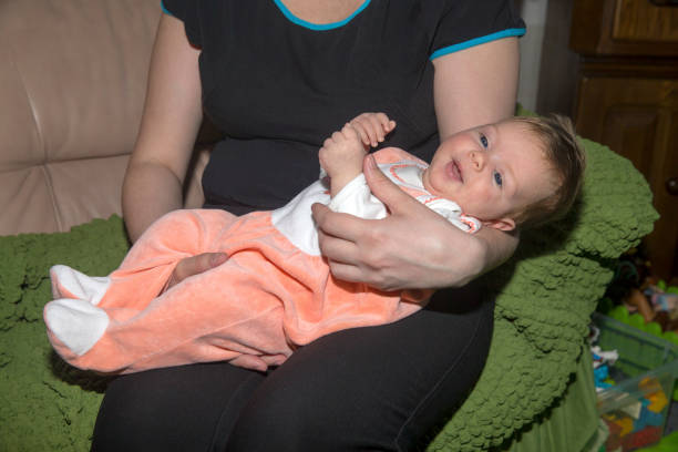 istock The baby on hands at mother. 1214524759