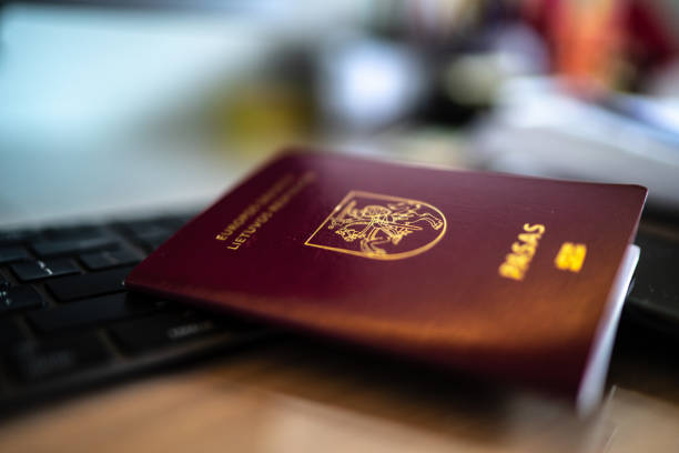 istock Lithuania passport at desk 1214526822
