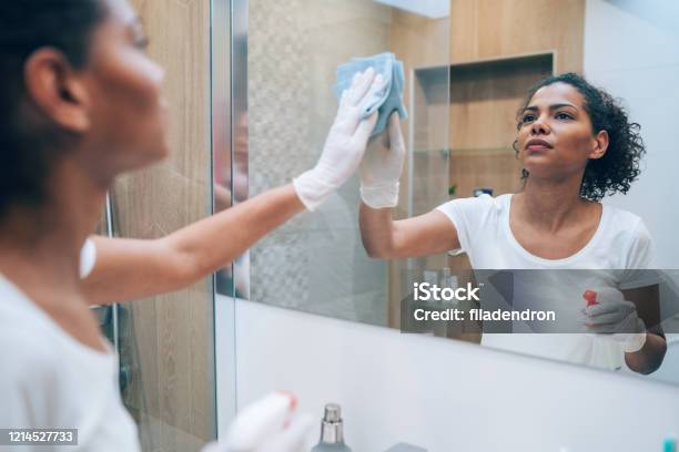 Covid19 Wiping Down Surfaces Stock Photo - Download Image Now - Mirror - Object, Cleaning, Clean