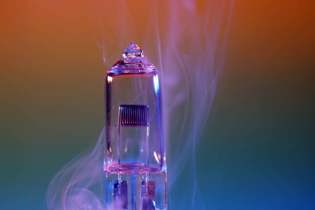 istock Electric light bulb with smoke photographed in the studio 1214528520