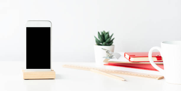 istock Mobile Phone On The Office Desk 1214528663
