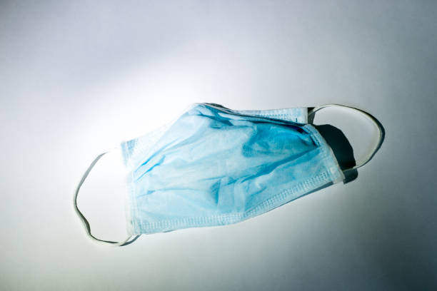 istock Medical disposable face mask that protects against the virus. 1214532277