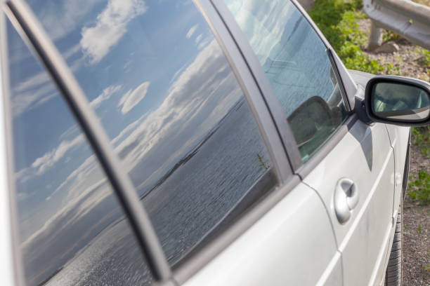istock Norwegian fjords are reflected in car glass 1214532507