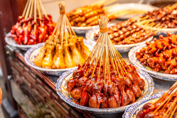 Asian street food. Thai food market This pic shows Asian stick street food on skewers.meat and other street food ready to grill can be seen in the pic. The pic is taken in november 2019. ratchaburi province stock pictures, royalty-free photos & images