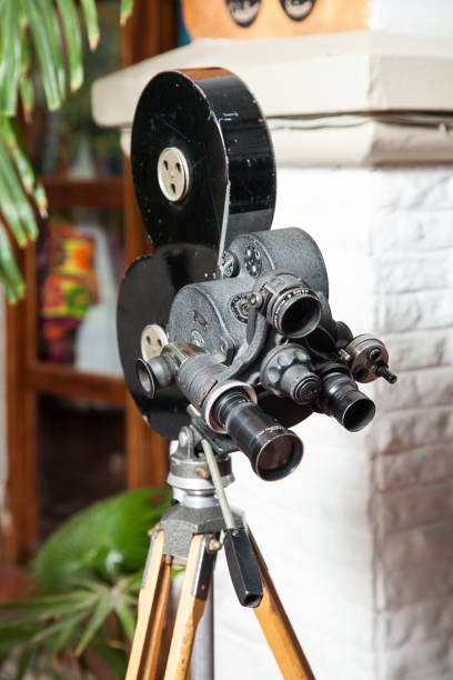 istock Cinema industry; old camera to film. 1214535107