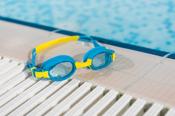 Blue swimming goggles isolated on white background
