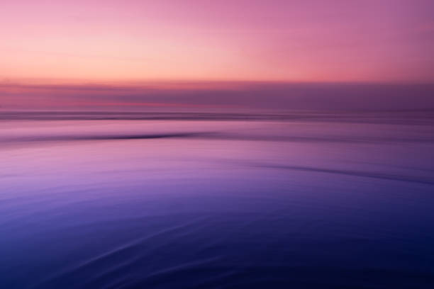 istock Sunset over the ocean. Blurred abstract background. 1214536950