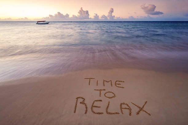istock handwritten Time to relax on sandy beach 1214537316