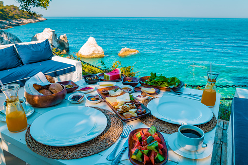 Turkish breakfast by the ocean, luxury resort in Turkey with breakfast coffee and juice and fruits