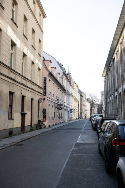 Berlin, Germany - March 23, 2020: The Sophienstrasse in Berlin Mitte is empty as people stay at home respecting the newly introduced guidelines to mitigate the spread of the COVID-19 Coronavirus pandemic.