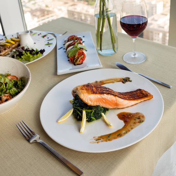 istock Salmon meal with sauce 1214543290