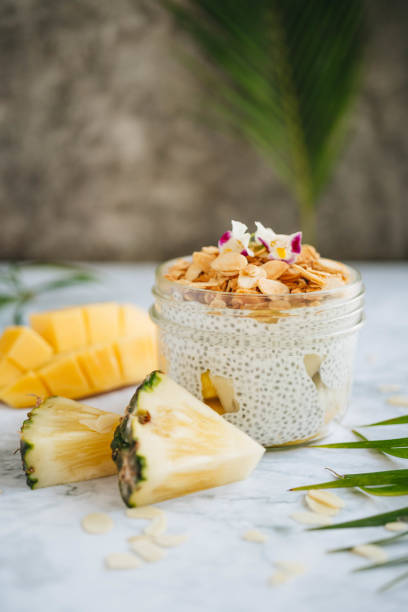 istock Chia pudding with mango, pineapple, almond nuts and oats 1214544917