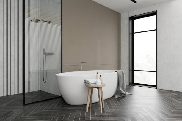istock White and beige bathroom corner, tub and shower 1214544949