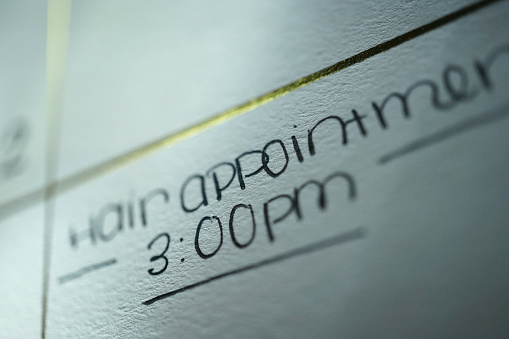 close up shot of hair appointment calendar