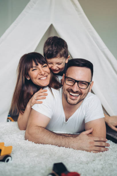 istock Happy young family with a little boy 1214546901