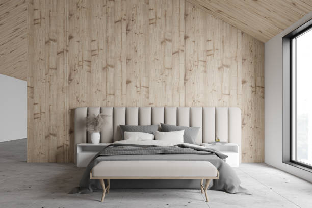 istock Stylish wooden attic master bedroom 1214547990