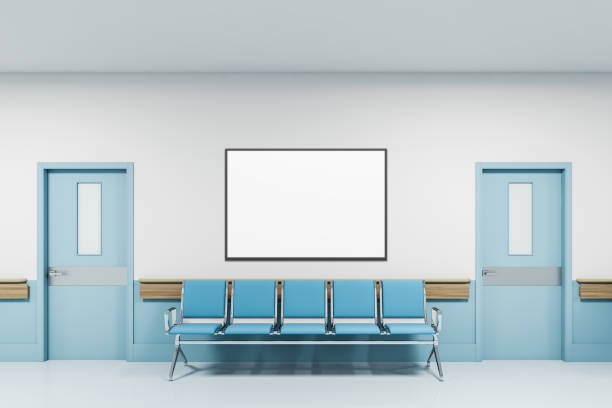 Chairs and poster in empty hospital hall