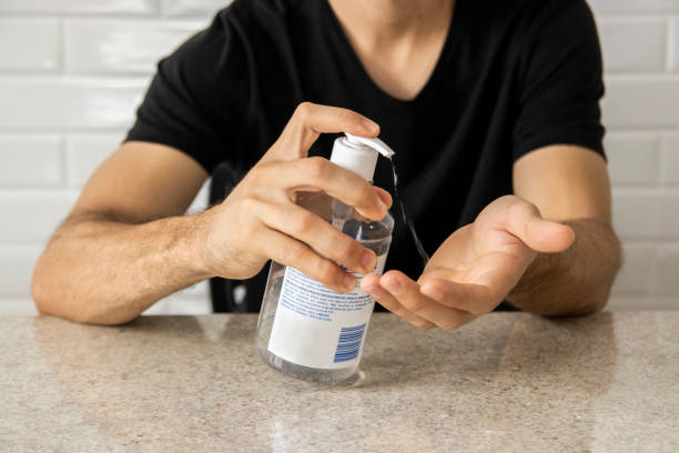 istock Coronavirus prevention. Man using alcohol gel for hand hygiene. Hygiene concept. Novel coronavirus. (2019-nCoV). Covid-19. 1214553440