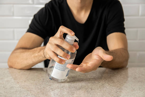 istock Coronavirus prevention. Man using alcohol gel for hand hygiene. Hygiene concept. Novel coronavirus. (2019-nCoV). Covid-19. 1214553565