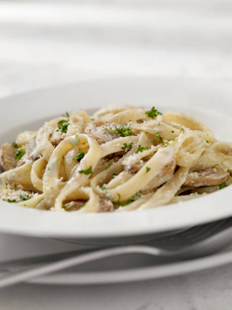 istock Creamy Mushroom Fettuccine Alfredo 1214553648