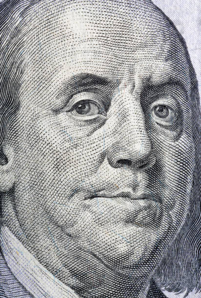 istock US President Benjamin Franklin portrait macro 1214555247