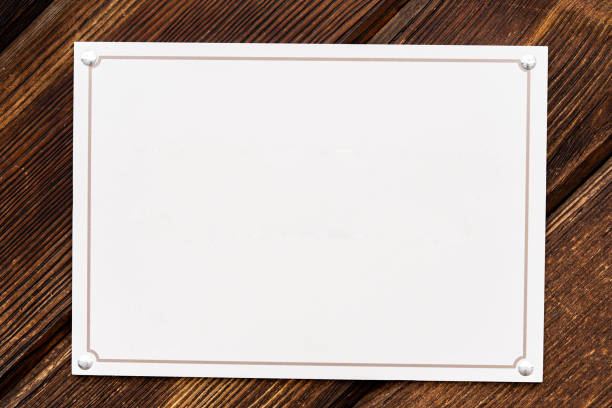 istock Old wooden door with sign and copy space. 1214556911