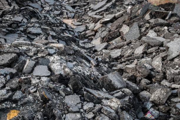 istock scrap of asphalt concrete that has been removed from the road 1214557255