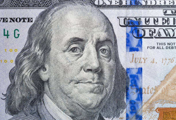 istock US President Benjamin Franklin portrait on one hundred dollar bill 1214561403