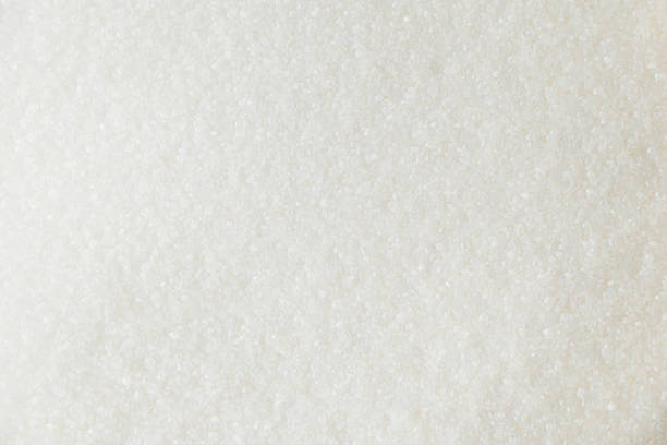 istock The texture of white sugar closeup. 1214563664