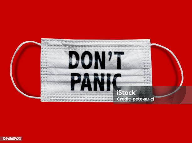 Protective Face Mask On A Red Background Dont Panic Stock Photo - Download Image Now