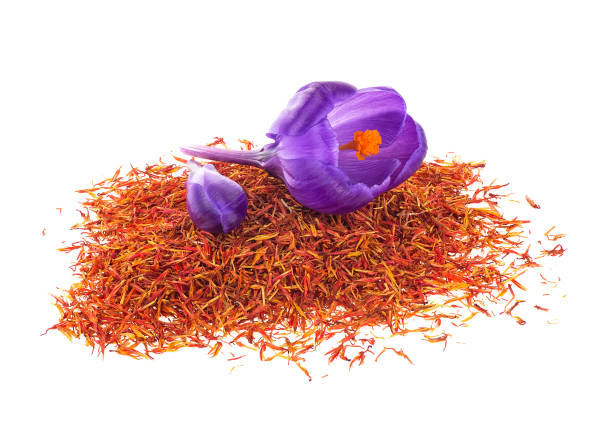 istock Flowers of crocus and dried saffron spice isolated on a white background. Crocus sativus. 1214568081