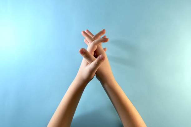 istock Phase 3 of hand processing in antiseptic. Processing internal between the finger zones. 1214568286