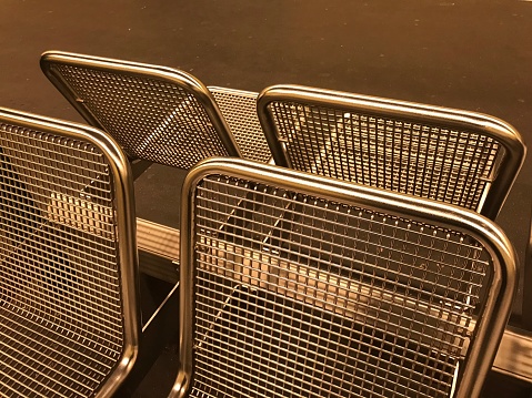 Metallic sitting chairs in a railways stations in Berlin