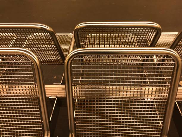 istock Metallic sitting chairs in a railways stations in Berlin 1214571109