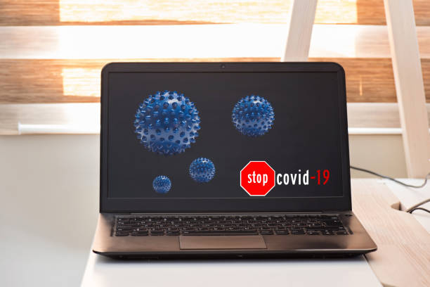 istock Black notebook and microscope virus close up. Coronavirus concept. Work from home concept 1214572086